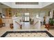 Bright lobby featuring tile flooring, staircase and large windows providing ample natural light at 8659 Fancy Finch Dr # 202, Tampa, FL 33614