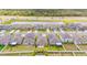 New neighborhood aerial view with modern homes, manicured lawns, and community lakes and green spaces at 9313 Channing Hill Dr, Ruskin, FL 33573