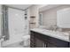 Well-appointed bathroom features granite counters, tub, and ample storage at 9313 Channing Hill Dr, Ruskin, FL 33573