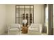 Bright seating area with coordinated decor and natural light from the window at 9352 Bonita Mar Dr, Parrish, FL 34219