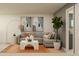 Cozy living room with a sectional sofa, contemporary decor, and lots of natural light at 9352 Bonita Mar Dr, Parrish, FL 34219