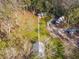 Secluded property with the main house, an additional outbuilding, an RV and wooded surroundings at 13381 Glory Ln, Brooksville, FL 34614