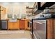 Modern kitchen with stainless steel appliances, wood countertops, and an apron sink at 13381 Glory Ln, Brooksville, FL 34614