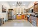 Bright and airy kitchen with stainless steel appliances, a chandelier, and lots of counter space at 13381 Glory Ln, Brooksville, FL 34614