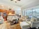 Open concept living room with views of the pool at 13422 Niti Dr, Hudson, FL 34669
