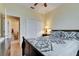 Bedroom featuring a large bed with black and white bedding and an open closet at 13454 Graham Yarden Dr, Riverview, FL 33579