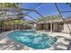 Inviting swimming pool with a screened enclosure, offering a private outdoor oasis and sunshine at 14019 Briardale Ln, Tampa, FL 33618