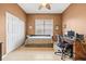 Cozy bedroom complete with a daybed, desk, and ample storage space at 16023 Golden Lakes Dr, Wimauma, FL 33598