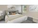 Bedroom featuring neutral decor, a large window and natural light at 17048 James Trl, Parrish, FL 34219
