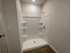 Bathroom shower with built-in shelving at 17048 James Trl, Parrish, FL 34219