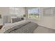 Serene bedroom with a large window and soft, neutral tones creating a relaxing atmosphere at 17056 James Trl, Parrish, FL 34219
