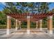 Community car wash station featuring a covered pergola and easy access, providing convenience for residents at 2138 Chianti Pl # 142, Palm Harbor, FL 34683