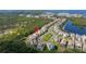 An aerial view of houses in a scenic neighborhood with a waterfront view and easy access to the marina at 2630 Yellow Sundial Loop, Ruskin, FL 33570