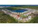 Aerial view of community, showcasing the waterfront location and lush landscaping at 2630 Yellow Sundial Loop, Ruskin, FL 33570