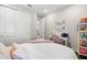 Bedroom with a desk area, closet and decor at 2630 Yellow Sundial Loop, Ruskin, FL 33570