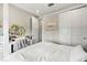 Bright bedroom featuring a neutral color palette and closet at 2630 Yellow Sundial Loop, Ruskin, FL 33570
