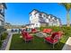 Inviting outdoor common area with comfortable seating and a fire pit, ideal for gatherings and relaxation at 2630 Yellow Sundial Loop, Ruskin, FL 33570