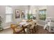 Bright dining room with natural light, and a stylish table perfect for Gathering gatherings at 2630 Yellow Sundial Loop, Ruskin, FL 33570