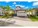Beautiful home with a two-car garage, lovely landscaping, and paver driveway at 2630 Yellow Sundial Loop, Ruskin, FL 33570