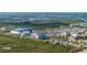 Aerial view showcasing a modern marina with boats, nestled in a vibrant residential community at 2630 Yellow Sundial Loop, Ruskin, FL 33570