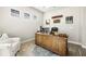 Bright office space with a large desk, comfortable seating, and natural light at 2630 Yellow Sundial Loop, Ruskin, FL 33570