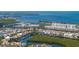 Breathtaking aerial perspective of waterfront homes, marina, and the intercoastal waterway at 2630 Yellow Sundial Loop, Ruskin, FL 33570