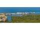 Scenic aerial view of waterfront houses and the intercoastal waterway at 2630 Yellow Sundial Loop, Ruskin, FL 33570