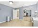 Spacious bedroom with tile flooring, closet, vanity and ensuite bathroom at 2710 Hibiscus W Dr, Belleair Beach, FL 33786