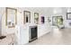 Kitchen island with wine cooler and ample storage at 2710 Hibiscus W Dr, Belleair Beach, FL 33786