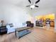 Open-concept living room flowing into a modern kitchen with stainless steel appliances at 2904 Lichen Ln # A, Clearwater, FL 33760