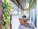 This covered patio features views of the yard and the surrounding neighborhood at 2904 Lichen Ln # A, Clearwater, FL 33760