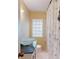 Cozy bathroom with a unique bowl sink and a shower with a patterned curtain at 345 12Th N Ave, Safety Harbor, FL 34695