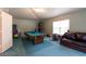 Spacious recreational room features a pool table, providing an ideal space for entertainment and relaxation at 3701 Barnhouse Pl, Valrico, FL 33596