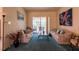 Formal living room with carpet, slider to pool and traditional furnishings at 3701 Barnhouse Pl, Valrico, FL 33596
