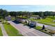 Elegant entrance to the community with decorative stone signage and lush landscaping at 4507 Majestic Hill Loop, Brooksville, FL 34601