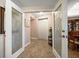 Inviting entryway featuring decorative glass doors and entry to dining area at 5301 Gulf Blvd # C202, St Pete Beach, FL 33706