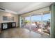 Living area opens to a patio with expansive water views, creating a seamless indoor-outdoor living experience at 5301 Gulf Blvd # C202, St Pete Beach, FL 33706