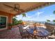 Beautiful covered patio featuring brick flooring and lovely water views at 5301 Gulf Blvd # C202, St Pete Beach, FL 33706