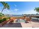 Relax on this beautiful patio with comfortable wicker furniture and enjoy the stunning waterfront views at 5301 Gulf Blvd # C202, St Pete Beach, FL 33706