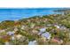Scenic coastal community with lush greenery, beach access, and views of the bay at 536 Ontario Ave, Crystal Beach, FL 34681