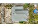 Aerial view of beautiful home with pool and landscaping at 536 Ontario Ave, Crystal Beach, FL 34681
