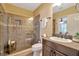 Bathroom features glass shower, vanity with granite counter, and tile floor at 536 Ontario Ave, Crystal Beach, FL 34681