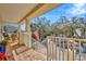 Relaxing front porch offers outdoor seating and views of the neighborhood, perfect for enjoying the outdoors at 536 Ontario Ave, Crystal Beach, FL 34681