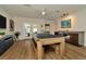Spacious game room with pool table, wet bar, and access to the outdoor patio at 536 Ontario Ave, Crystal Beach, FL 34681