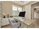 Bright home office features a sleek desk, comfortable seating, and plenty of natural light at 536 Ontario Ave, Crystal Beach, FL 34681