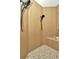 Walk-in shower featuring dual shower heads, stylish tile walls, and a pebble tile floor at 536 Ontario Ave, Crystal Beach, FL 34681