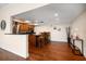 Kitchen area with wood cabinets, stainless steel appliances, and an island with seating at 700 Island Way # 404, Clearwater Beach, FL 33767