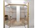 Spacious walk-in closet with carpeted floor, mirrors, and shelving at 700 Island Way # 404, Clearwater Beach, FL 33767