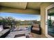 Relaxing balcony offers seating with outdoor furniture, complete with serene waterfront views at 74 Gulf Blvd # 2B, Indian Rocks Beach, FL 33785