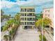 Multi-story condo building with balconies offering ocean views and parking at 74 Gulf Blvd # 2B, Indian Rocks Beach, FL 33785